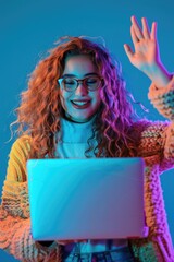 Poster - A woman sitting with a laptop and glasses, ideal for business or educational settings