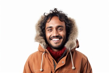 Sticker - Portrait of a cheerful indian man in his 30s wearing a warm parka on white background