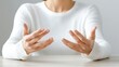 © Papugrat - A person gesturing with their hands, conveying a sense of explanation or emotion. This represents communication and interaction.