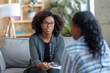© Robert Kneschke - African American female counselor demonstrating empathy during a therapy session