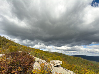 Beautiful early autumn mountain view on cloudy day. Image feature hiking path at Minnewaska, New York