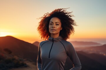 Sticker - Portrait of a content afro-american woman in her 30s sporting a breathable mesh jersey in vibrant sunset horizon