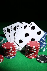 Poster - Poker chips and playing cards on green table