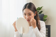 © Pormezz - asian young woman using medical eye drops to treat dry eye and irritation.