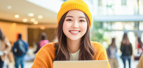 Sticker - young beautiful girl using laptop at college campus