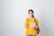 © PRASANNAPIX - young indian college girl holding notebook on isolated background