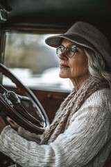 Poster - A woman wearing a hat and glasses drives a car on a road
