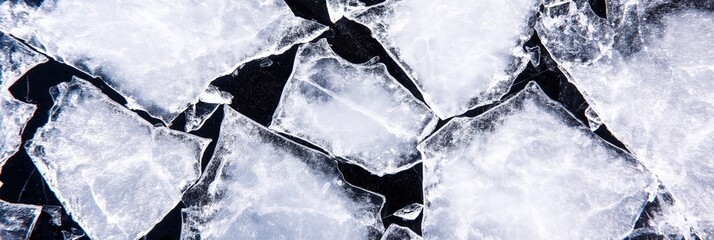 Wall Mural - Panoramic banner of cracked ice surface close-up - shattered patterns