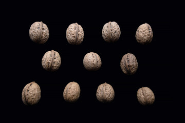 walnuts on a black background