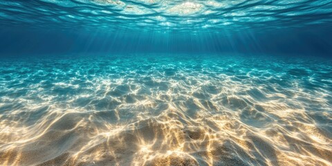 Poster - A shot of the ocean's surface where sunlight is shining through, suitable for use as a background or illustration