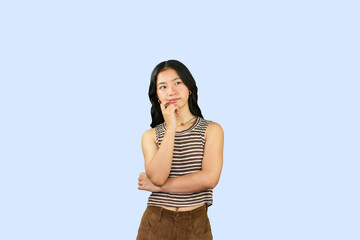 Excited Asian Student Girl gives expression hand fa gesture of sad, wow, happy, laughing in blue background