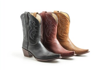 Poster - Three pairs of cowboy boots on a white background