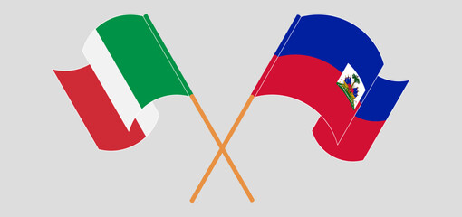 Wall Mural - Crossed and waving flags of Italy and Republic of Haiti. Vector illustration