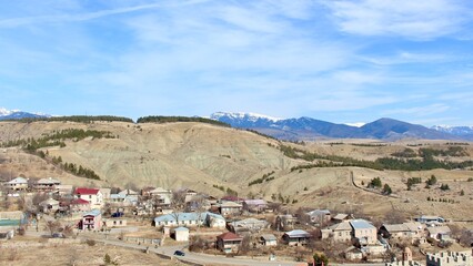 village in the mountains in Georgia in winter 