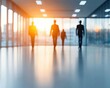 © Creator88 - abstract composition of blurred human silhouettes in modern openplan office space conveying busy collaborative atmosphere