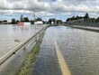 © Joanna Potok - Flooded and impassable national road DK1 due to pool of water at confluence of Rivers Wapienica and Iłownica during flood in September 2024 in Poland in Czechowice Dziedzice. Topic: river alert status