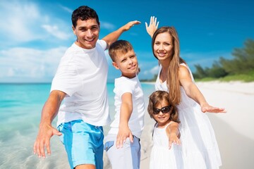 Wall Mural - Happy family, Parents, children at vacation near sea