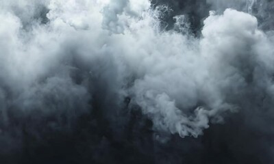 Wall Mural - a dramatic cloud formation with swirling gray and white hues against a dark background.