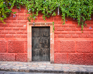 red wall with door