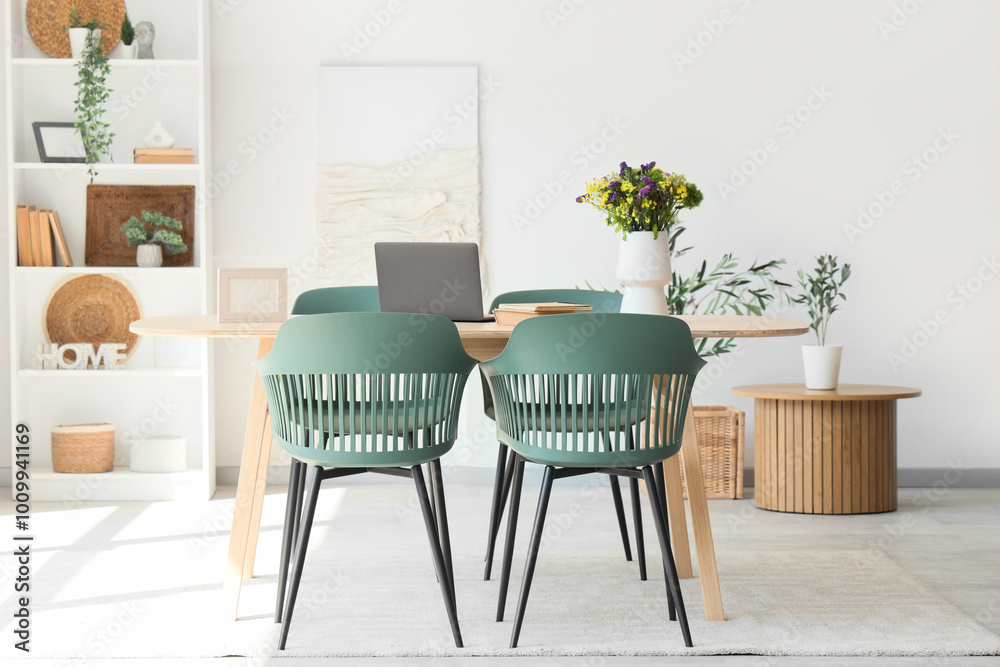 Interior of dining room with table and shelf unit