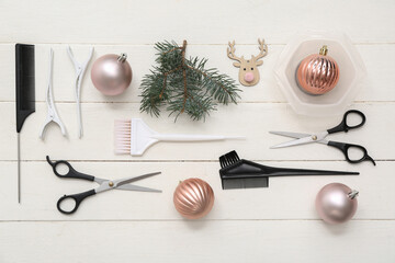 Sticker - Hairdresser's tools with Christmas balls and fir branches on white wooden background