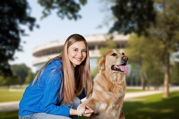 Poster - Beautiful young woman walks in autumn park wirh dog