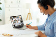 © Kateryna - Video call with team.Side view of caucasian business woman having online meeting with her multiracial colleagues, talking about project plan and strategy via video conference, share ideas, takes notes