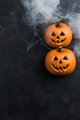 Canvas Print - Spooky jack-o-lanterns with smoke on dark background