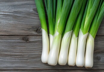 Sticker - Fresh organic leeks on wooden background