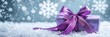 © Brian - purple ribbon and bow on winter snowflake background, gift wrap concept
