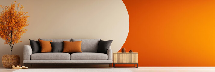 Sticker - A modern living room with a grey sofa, orange and black pillows, and an orange and beige wall.