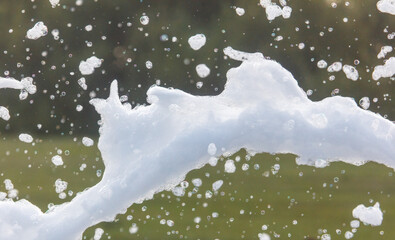 Wall Mural - A large amount of white foam or bubbles in the air