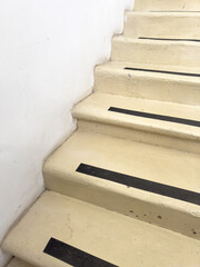 Wall Mural - The stairs are white and black with black and white stripes