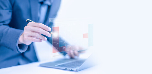 Fototapete - man plan and schedule calendar online on a laptop. concept of managing a planning meeting, arranging appointment agendas in business, and timeline design on technology digital