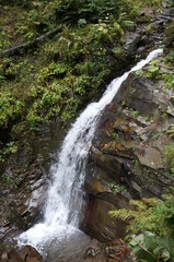 Poster - A beautiful waterfall in a mountainous and wooded area. Mendelikha Park.