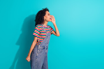 Wall Mural - Photo portrait of pretty young girl scream share secret profile wear trendy denim outfit isolated on aquamarine color background