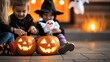 © Achirawee - A wide-angle view of a house front decorated for Halloween, featuring glowing jack-o'-lanterns, hanging ghosts, and dim orange lights. Children in costumes are gathered on the porch, adding to the