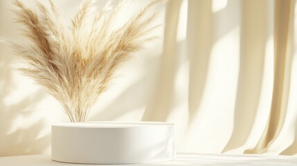 Sticker - A minimalist arrangement featuring dried pampas grass in a white vase against soft drapery.