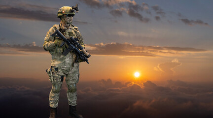 soldier over clouds in the sunset