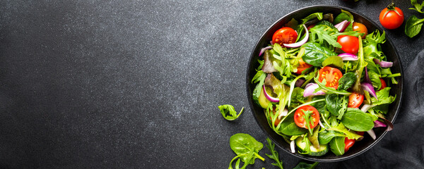 Wall Mural - Healthy food, vegan bowl. Green Salad with fresh leaves and vegetables. Flat lay with copy space. web format.