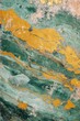 © Alexandr - Close-up of green and yellow marbles