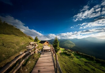 Aufkleber - A wooden walkway leads to a cabin nestled in a lush mountainside, surrounded by a vibrant blue sky and wispy clouds.