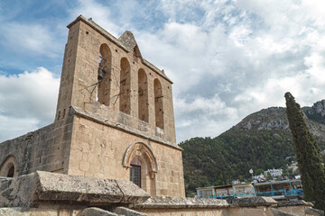 Wall Mural - Bellapais Abbey showing its large belfry with three bells. Kyrenia District, Cyprus