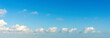 © evening_tao - Tranquil Blue Sky with Soft White Clouds