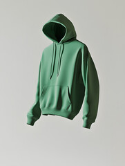 Wall Mural - A green hoodie sweatshirt floating in the air mock up, isolated on white background