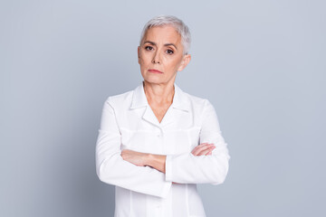 Canvas Print - Photo of attractive confident qualified specialist doctor woman surgeon wear white robe isolated on grey color background