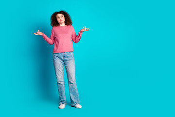 Poster - Full body portrait of nice young girl shrug shoulders empty space isolated on turquoise color background