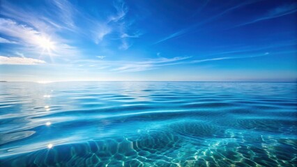 Soothing water surface of the sea with gentle wave ripples under the clear blue sky