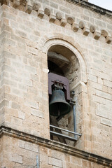 Bell tower of the old church in Italy, Puglia region