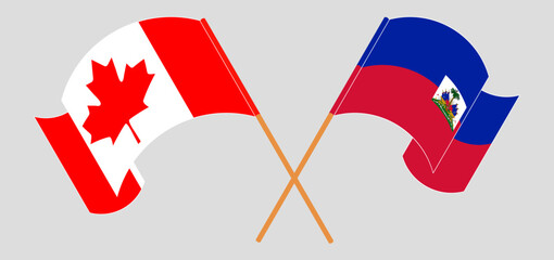 Wall Mural - Crossed and waving flags of Canada and Republic of Haiti. Vector illustration